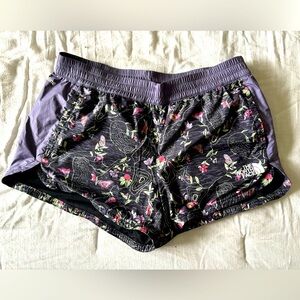 The North Face Women’s L Hydrenaline Windwall Athletic Shorts Purple/Blk Floral